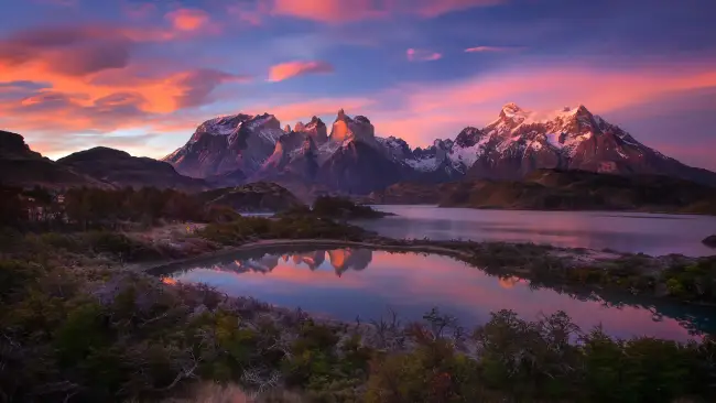 Where can I experience the beauty of the Andes Mountains?