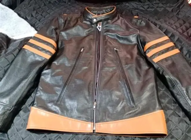 How can I safely shrink my leather jacket at home?