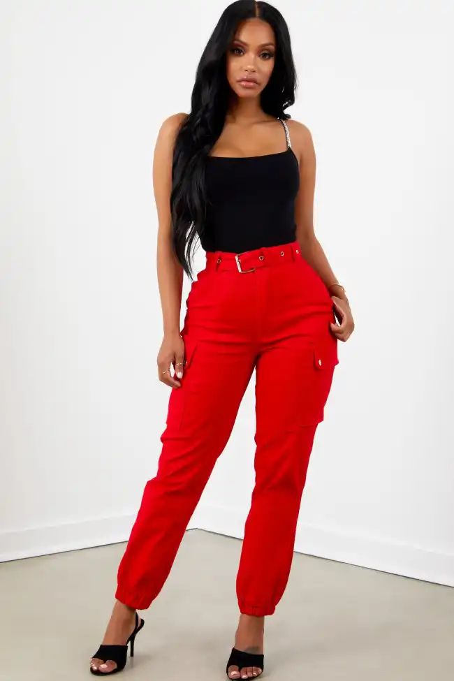 What shirt color complements red pants best?