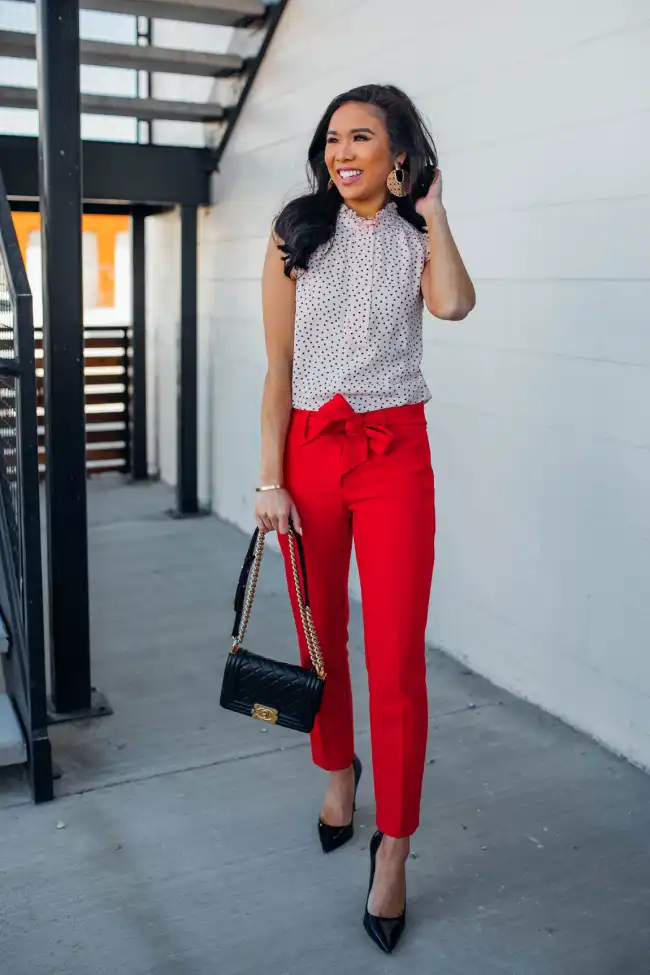 What shirt color complements red pants best?