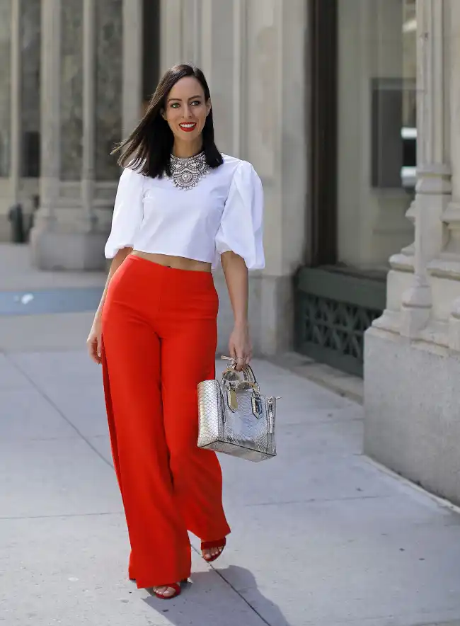 What shirt color complements red pants best?