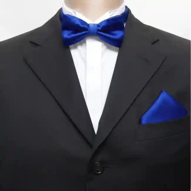 black suit with a blue bow tie