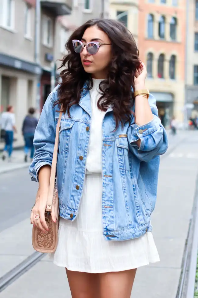 denim jacket with a white dress