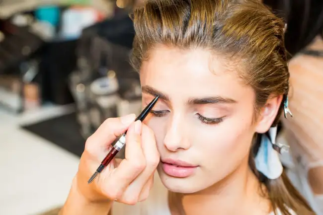 Should You Apply Makeup Before or After Styling Your Hair?